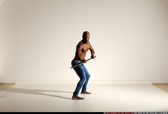 Man Adult Athletic Black Fighting with spear Moving poses Pants