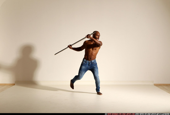 Man Adult Athletic Black Fighting with spear Moving poses Pants