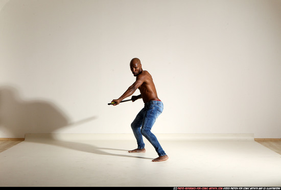 Man Adult Athletic Black Fighting with spear Moving poses Pants