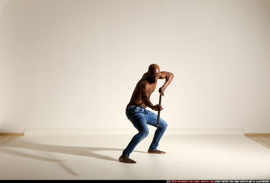 Man Adult Athletic Black Fighting with spear Moving poses Pants