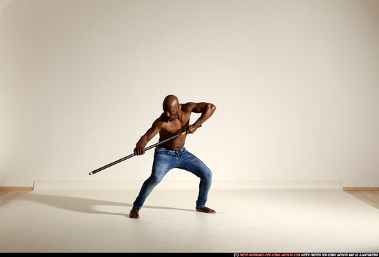 Man Adult Athletic Black Fighting with spear Moving poses Pants