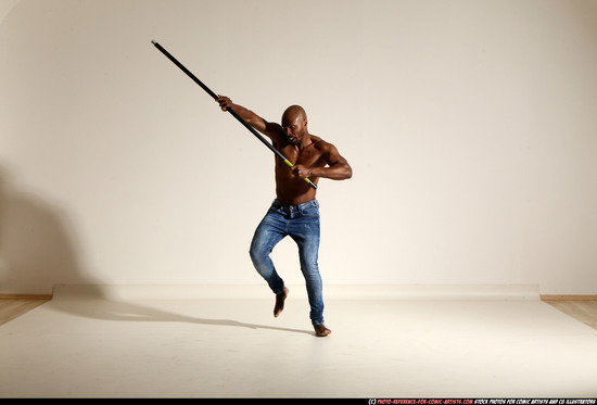 Man Adult Athletic Black Fighting with spear Moving poses Pants