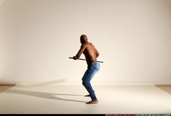 Man Adult Athletic Black Fighting with spear Moving poses Pants