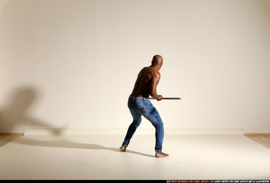 Man Adult Athletic Black Fighting with spear Moving poses Pants