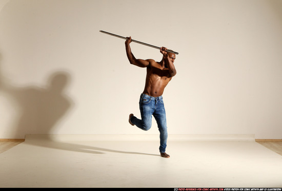 Man Adult Athletic Black Fighting with spear Moving poses Pants