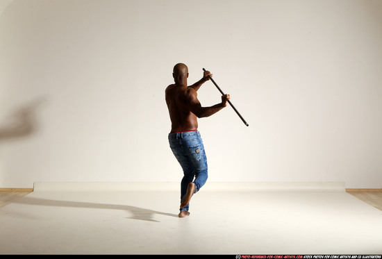 Man Adult Athletic Black Fighting with spear Moving poses Pants