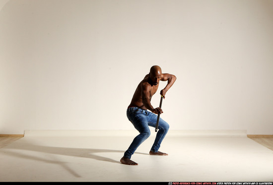 Man Adult Athletic Black Fighting with spear Moving poses Pants