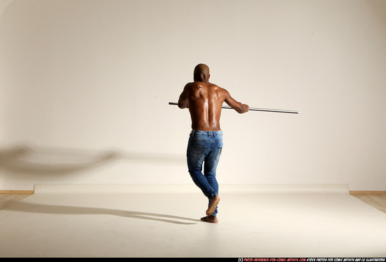 Man Adult Athletic Black Fighting with spear Moving poses Pants