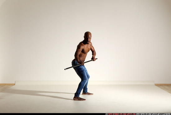 Man Adult Athletic Black Fighting with spear Moving poses Pants