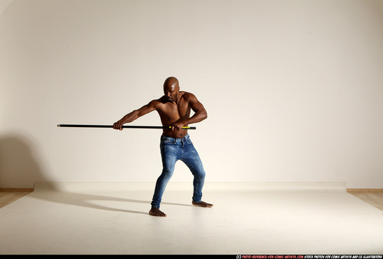 Man Adult Athletic Black Fighting with spear Moving poses Pants