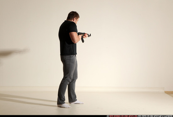 Man Adult Muscular White Fighting with submachine gun Moving poses Casual