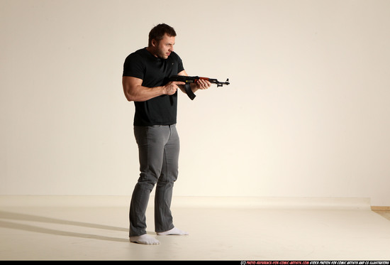 Man Adult Muscular White Fighting with submachine gun Moving poses Casual