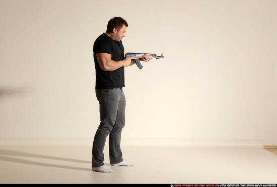 Man Adult Muscular White Fighting with submachine gun Moving poses Casual