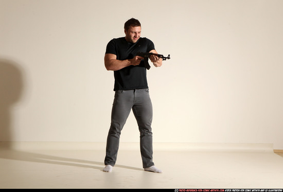 Man Adult Muscular White Fighting with submachine gun Moving poses Casual