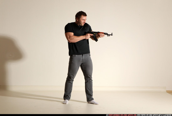 Man Adult Muscular White Fighting with submachine gun Moving poses Casual