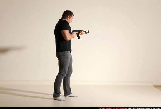 Man Adult Muscular White Fighting with submachine gun Moving poses Casual