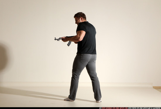 Man Adult Muscular White Fighting with submachine gun Moving poses Casual