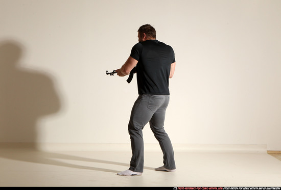 Man Adult Muscular White Fighting with submachine gun Moving poses Casual