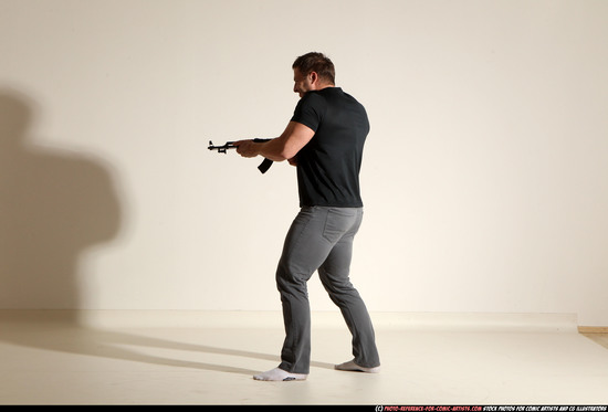 Man Adult Muscular White Fighting with submachine gun Moving poses Casual