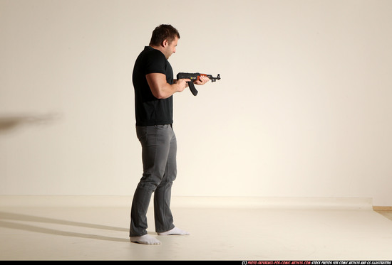 Man Adult Muscular White Fighting with submachine gun Moving poses Casual