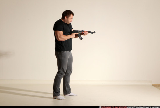 Man Adult Muscular White Fighting with submachine gun Moving poses Casual