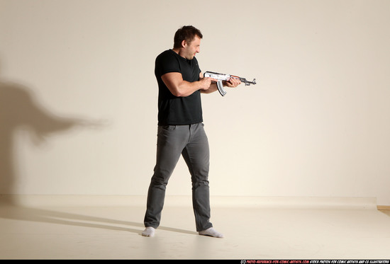 Man Adult Muscular White Fighting with submachine gun Moving poses Casual