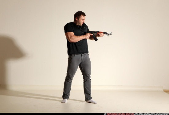 Man Adult Muscular White Fighting with submachine gun Moving poses Casual