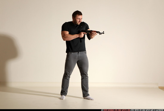 Man Adult Muscular White Fighting with submachine gun Moving poses Casual