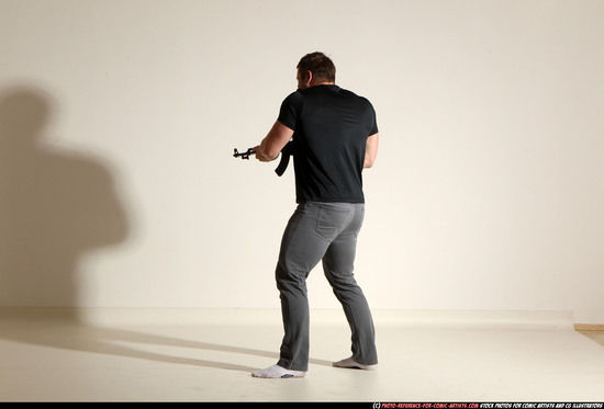 Man Adult Muscular White Fighting with submachine gun Moving poses Casual