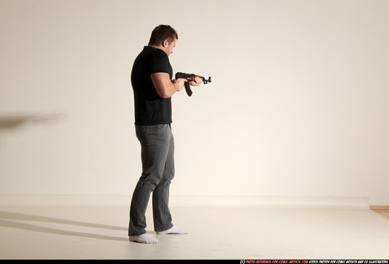 Man Adult Muscular White Fighting with submachine gun Moving poses Casual