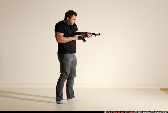 Man Adult Muscular White Fighting with submachine gun Moving poses Casual