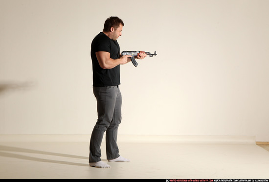 Man Adult Muscular White Fighting with submachine gun Moving poses Casual