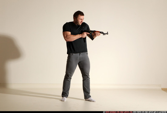 Man Adult Muscular White Fighting with submachine gun Moving poses Casual