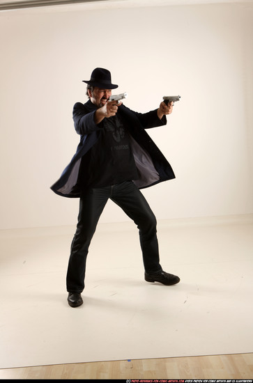 Man Old Average White Fighting with gun Standing poses Coat