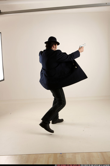 Man Old Average White Fighting with gun Standing poses Coat