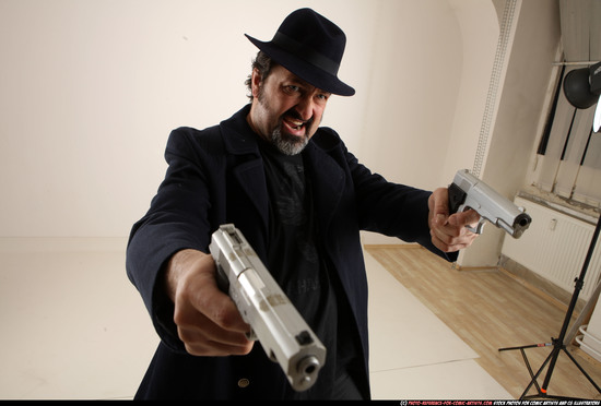 Man Old Average White Fighting with gun Standing poses Coat