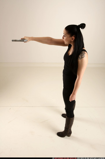 Woman Adult Athletic White Fighting with gun Standing poses Casual