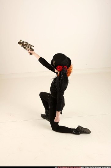 Woman Adult Athletic White Fighting with gun Kneeling poses Casual