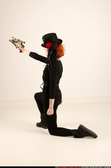 Woman Adult Athletic White Fighting with gun Kneeling poses Casual