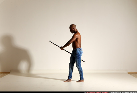 Man Adult Athletic Black Fighting with spear Moving poses Pants