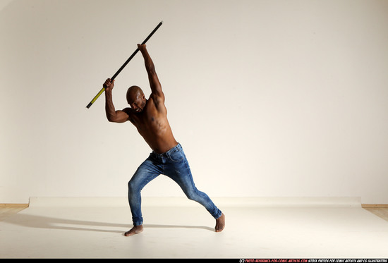 Man Adult Athletic Black Fighting with spear Moving poses Pants