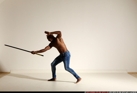 Man Adult Athletic Black Fighting with spear Moving poses Pants