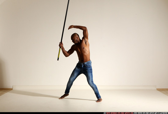 Man Adult Athletic Black Fighting with spear Moving poses Pants