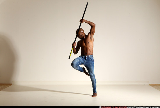 Man Adult Athletic Black Fighting with spear Moving poses Pants