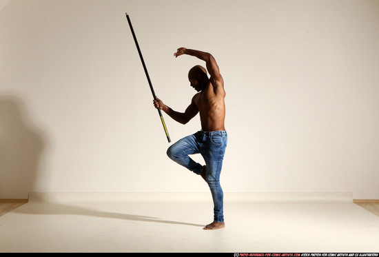 Man Adult Athletic Black Fighting with spear Moving poses Pants