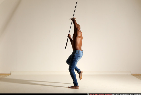 Man Adult Athletic Black Fighting with spear Moving poses Pants