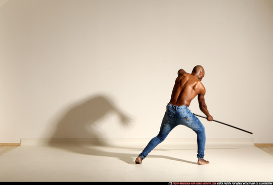 Man Adult Athletic Black Fighting with spear Moving poses Pants