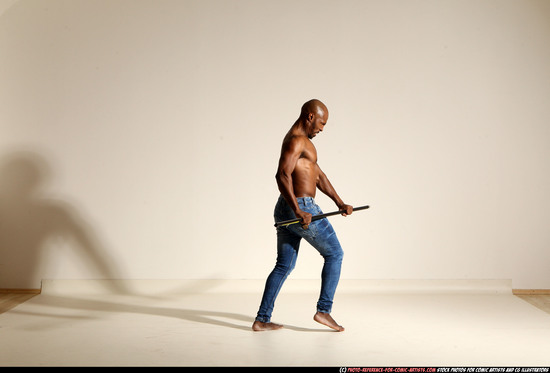 Man Adult Athletic Black Fighting with spear Moving poses Pants