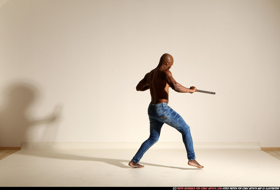 Man Adult Athletic Black Fighting with spear Moving poses Pants