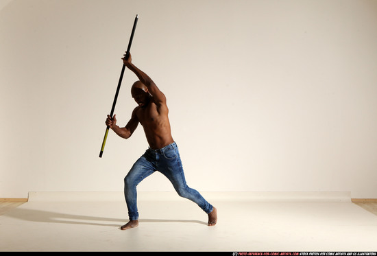 Man Adult Athletic Black Fighting with spear Moving poses Pants